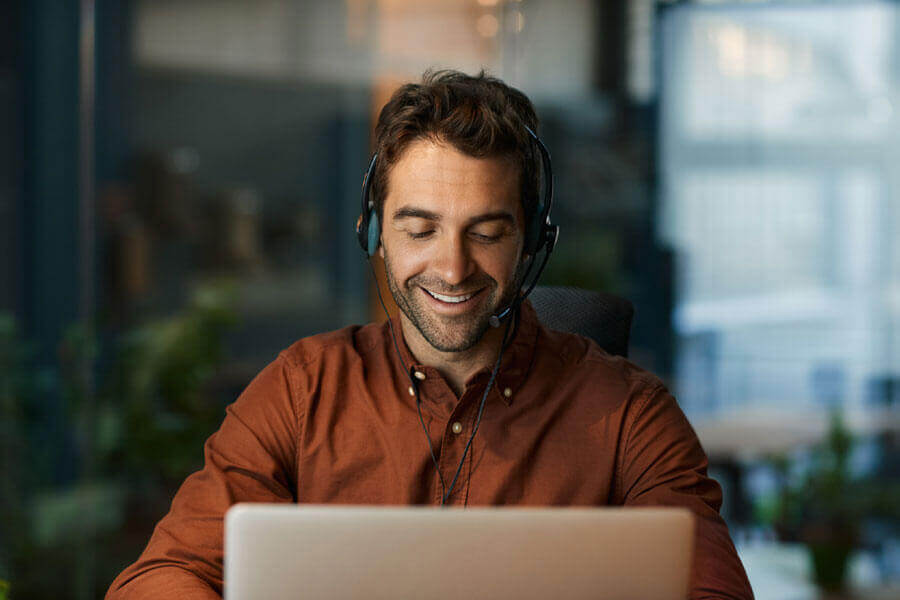 A professional providing managed IT services to a client in Edmonton.